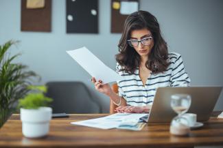 Woman reviewing paperwork